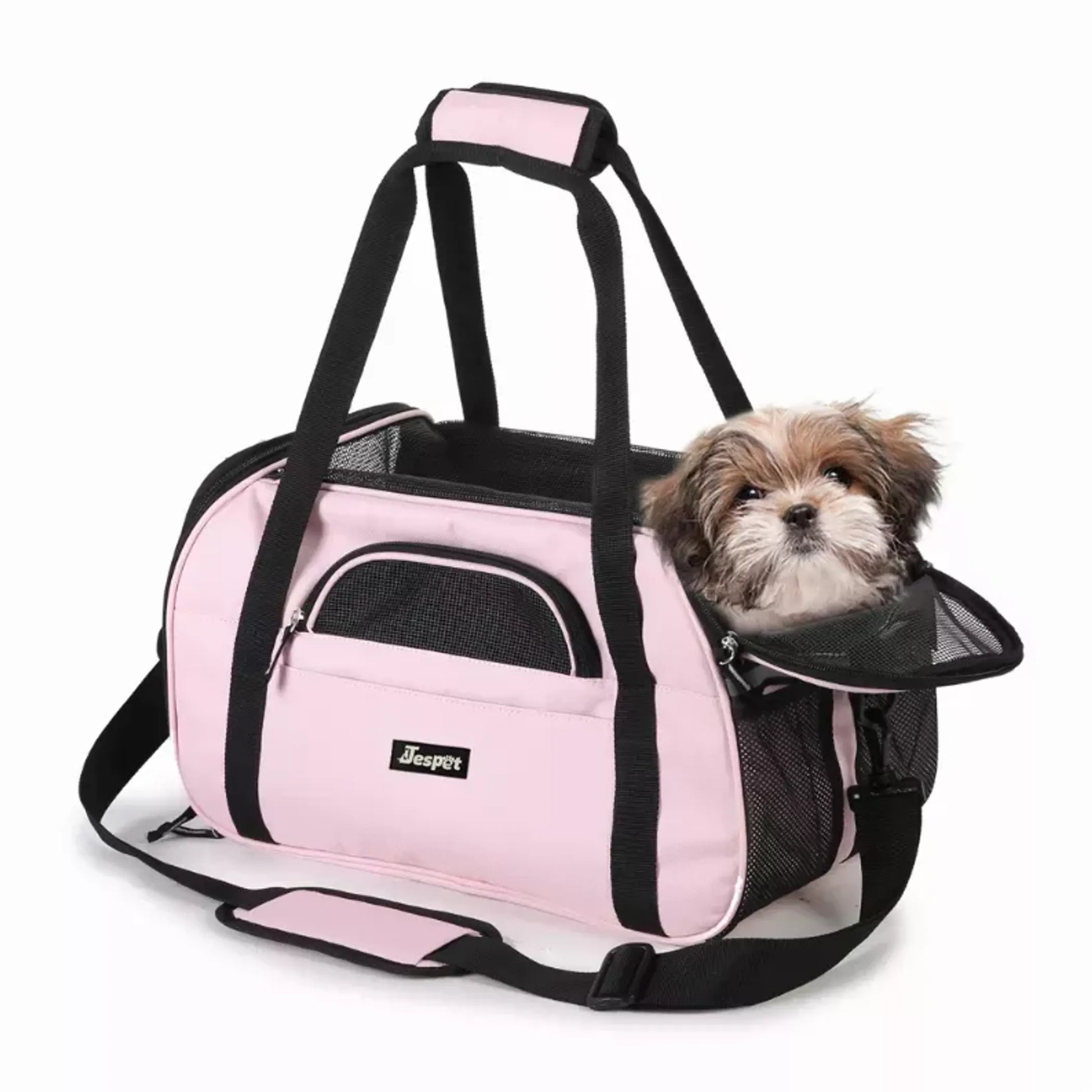 Dog in pink jesper soft sided pet carrier