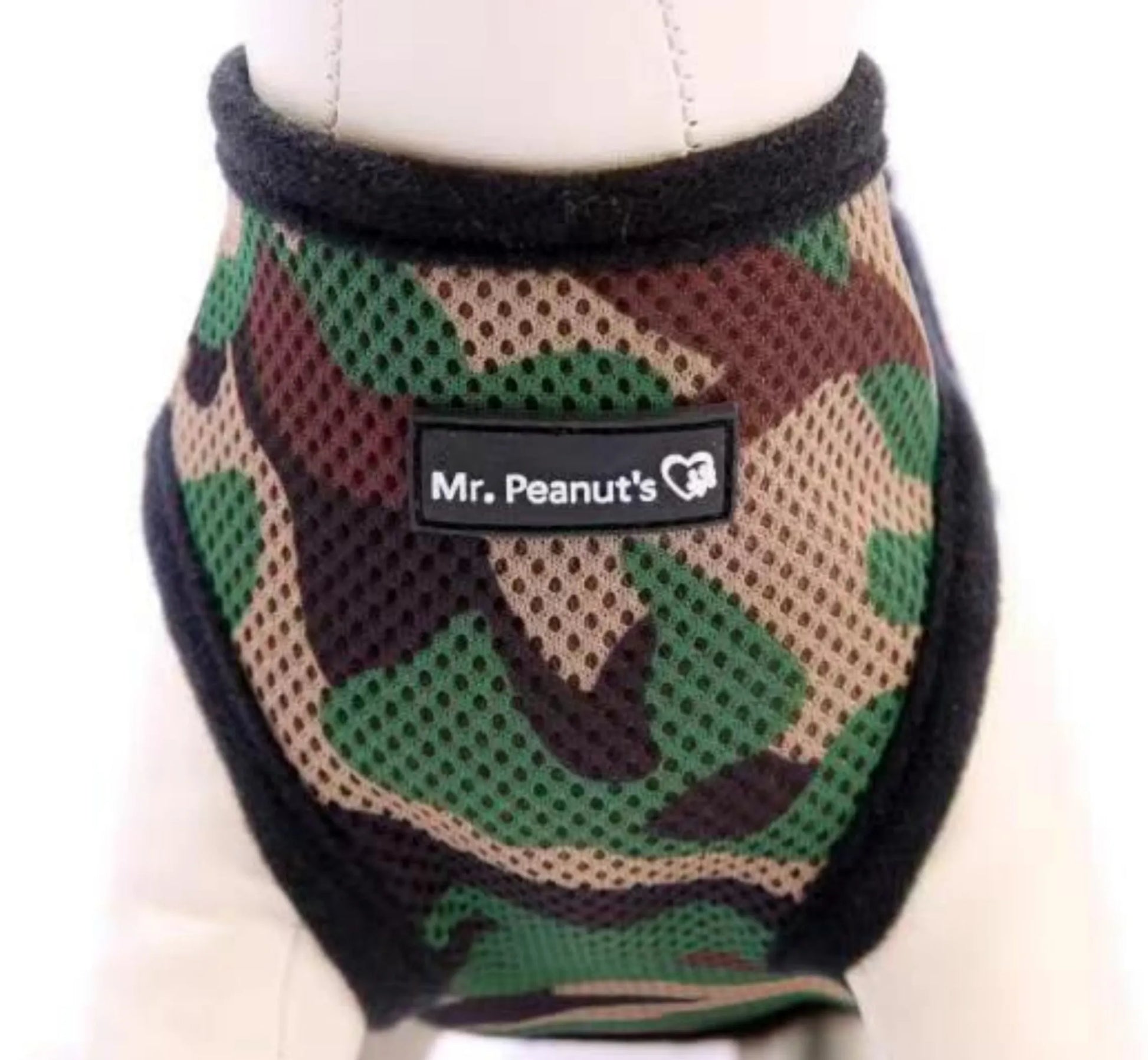 Camouflage dog harness with 'Mr. Peanut's' label on a white background