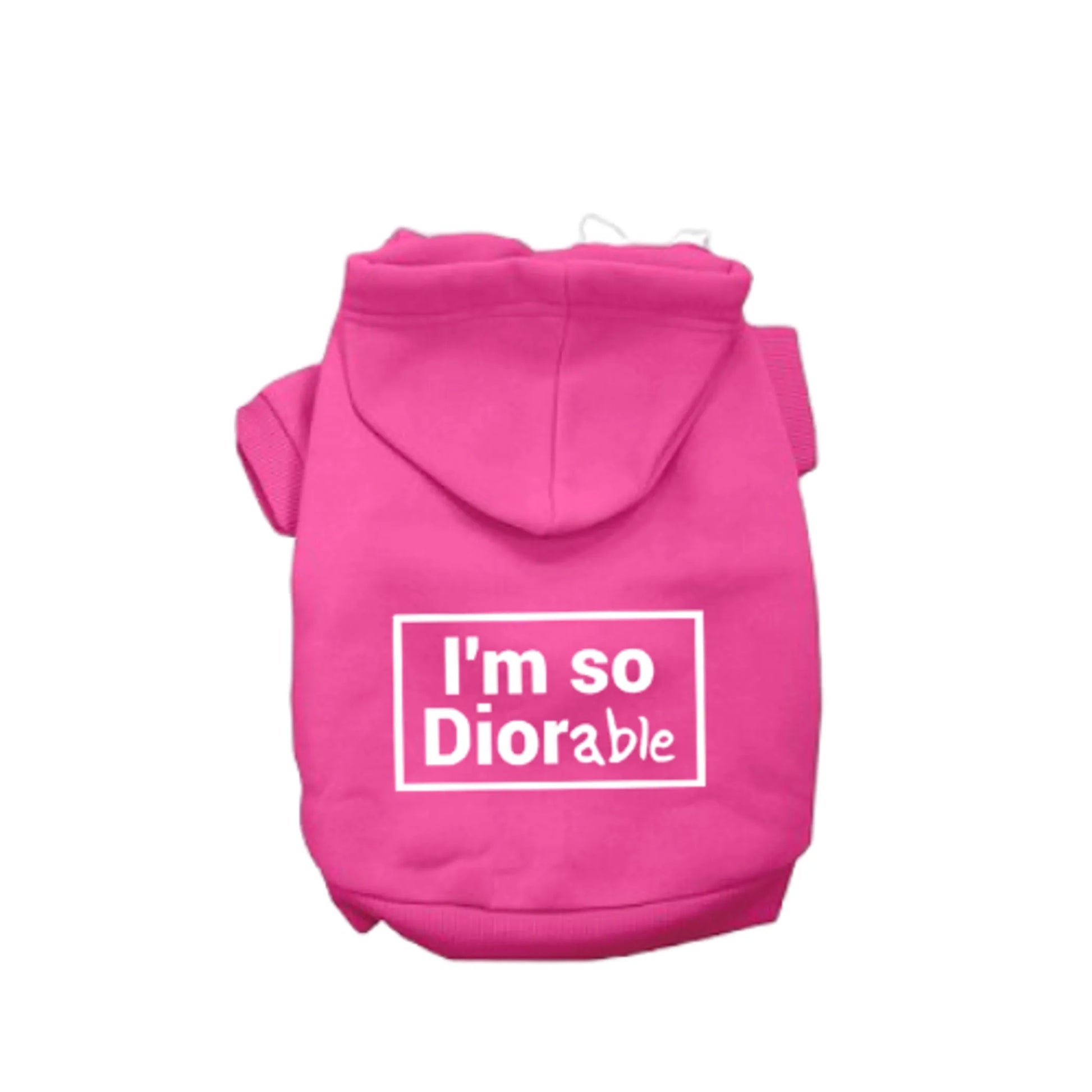 Pink dog hoodie with 'I'm so Diorable' text on a white background