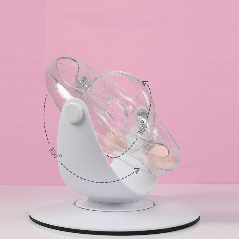 White cat interactive toy on a pink background side view