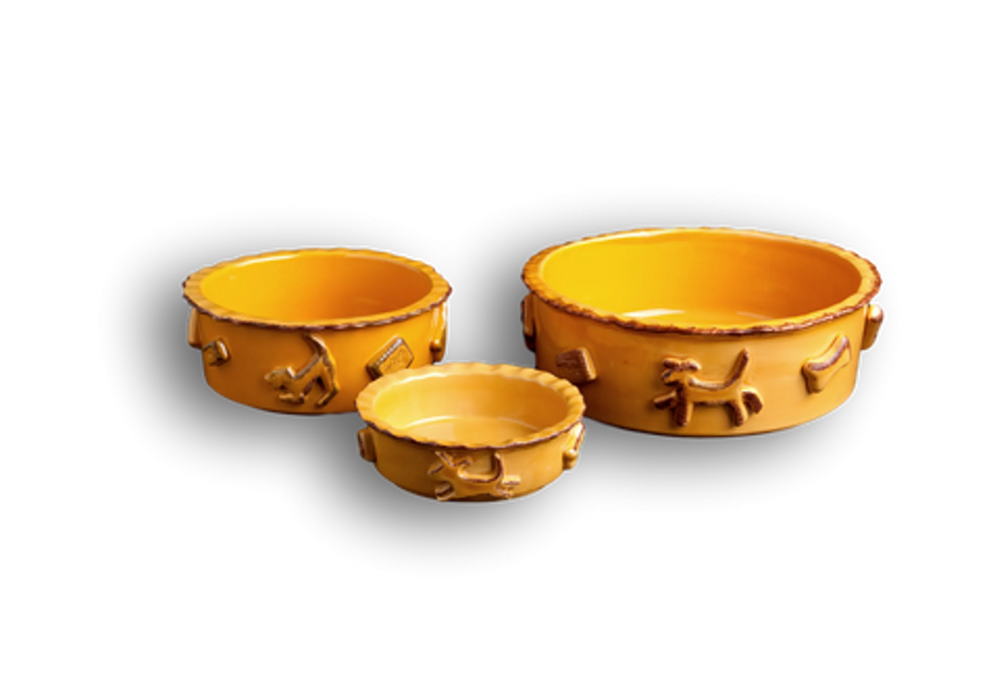 Three orange ceramic bowls with textured design on a white background