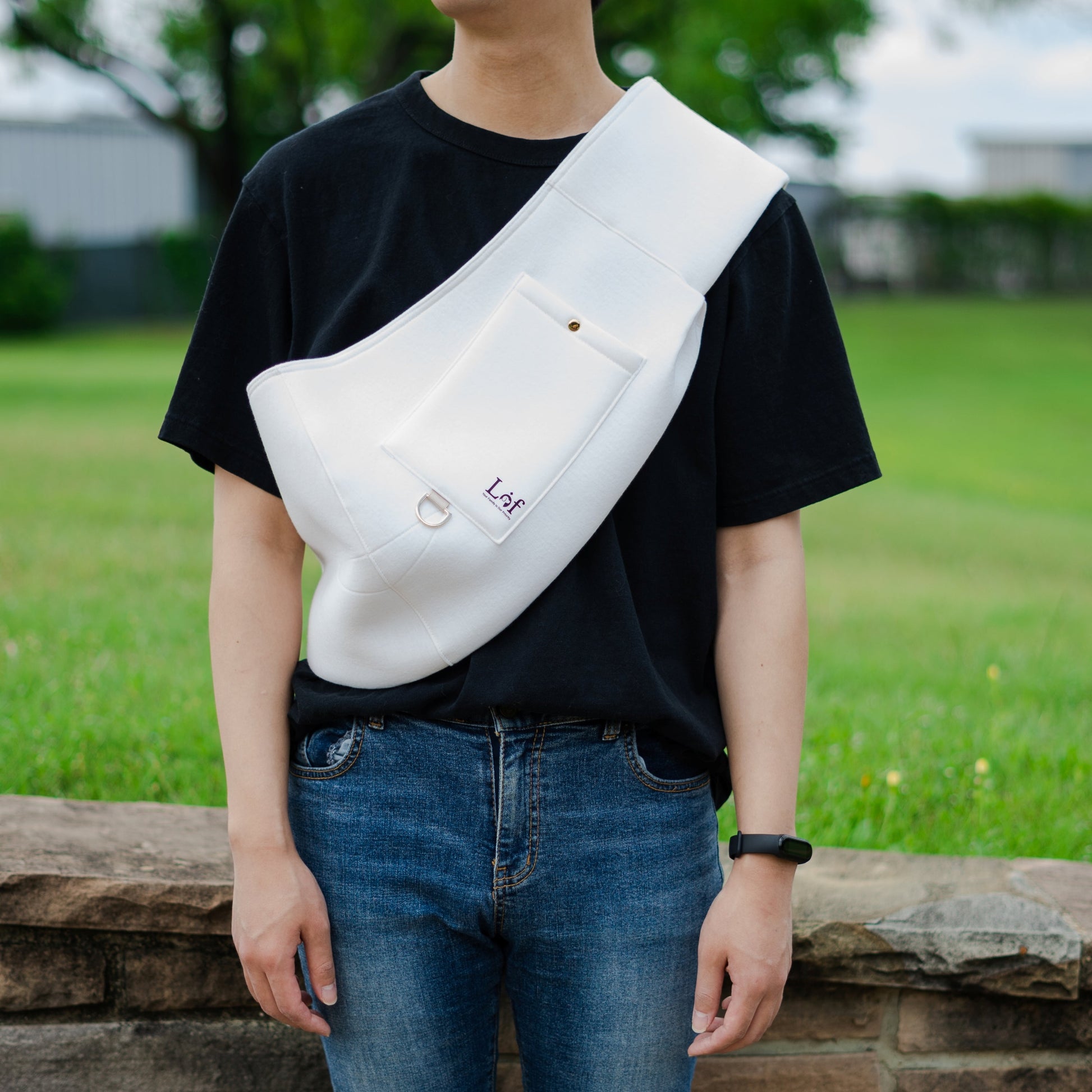 person image with white neoprene dog sling