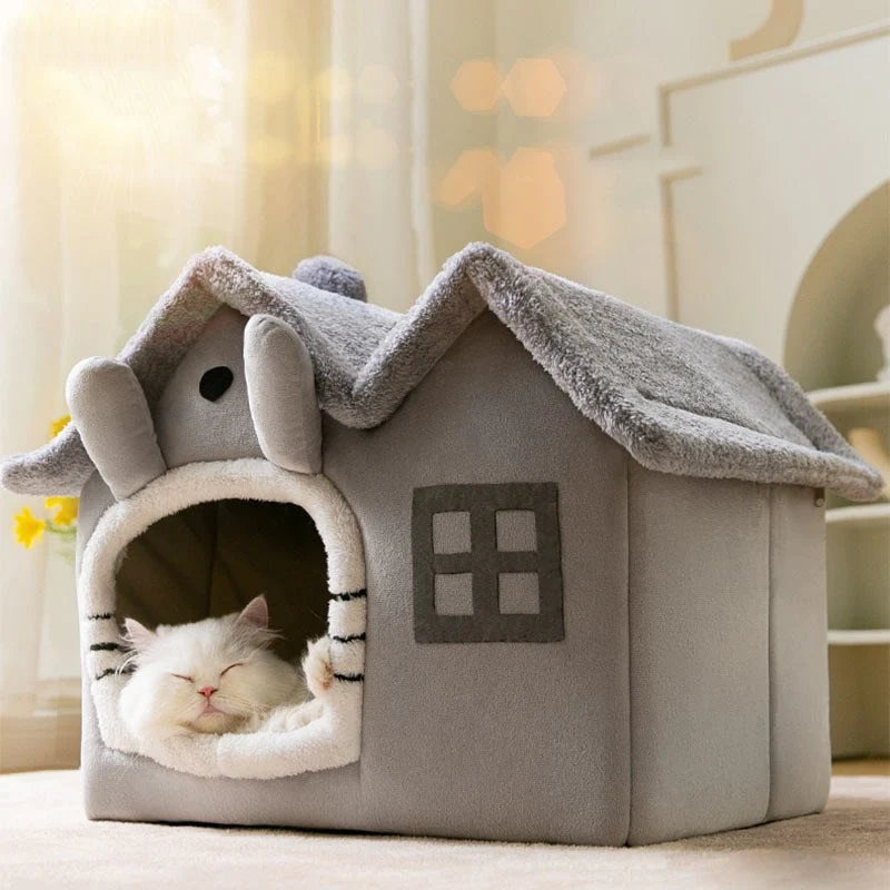 white cat sleeping in removable roof house