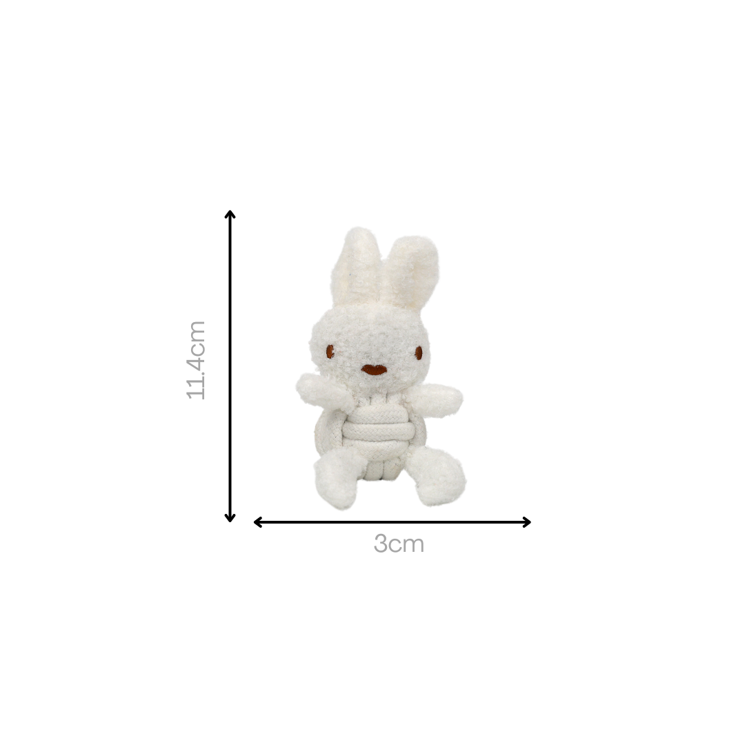 White plush toy with dimensions indicated on a white background