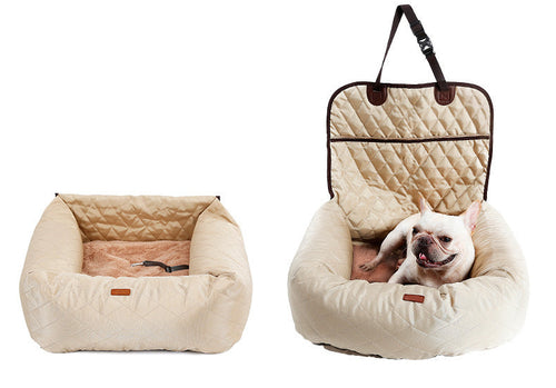 Car seat carrier in beige and French bulldog in fluffy dog carrier car seat