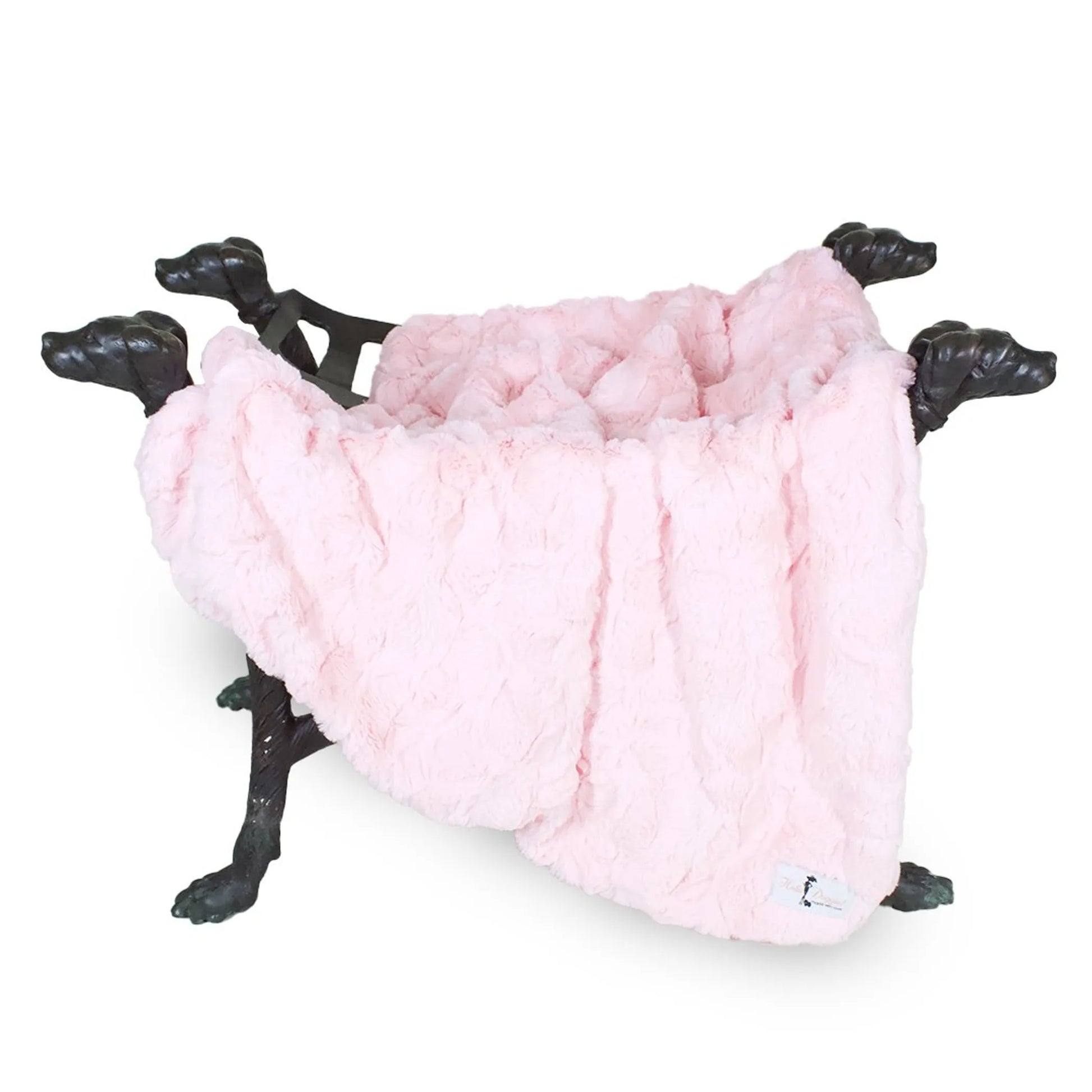Pink pet bed with black metal frame on a white background