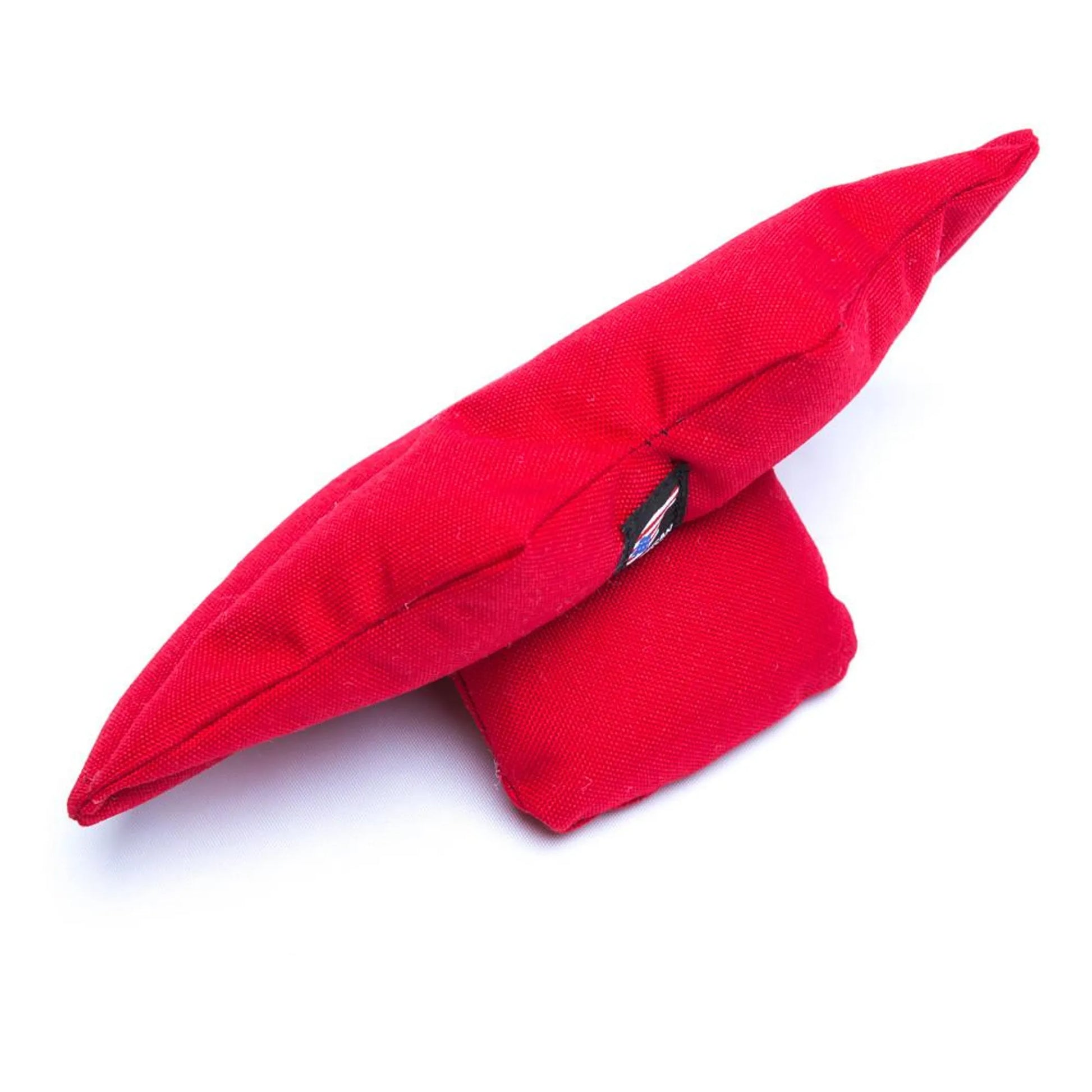 Red lips dog toy on a white background