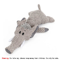 Knitted elephant toy on a white background with a warning label.
