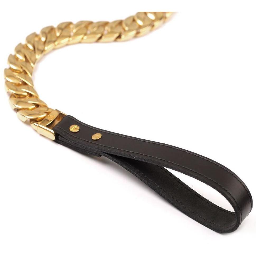 gold plated dog lease with black handle